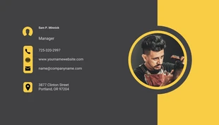 Free  Template: Cartão de visita profissional preto e amarelo Barber